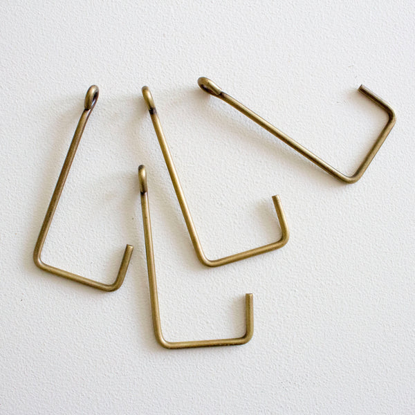 The Humble Hook, 40 Ways  Coat hooks on wall, Brass wall hook, Modern coat  rack