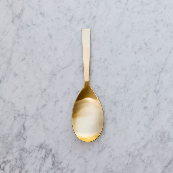 brass serving spoon